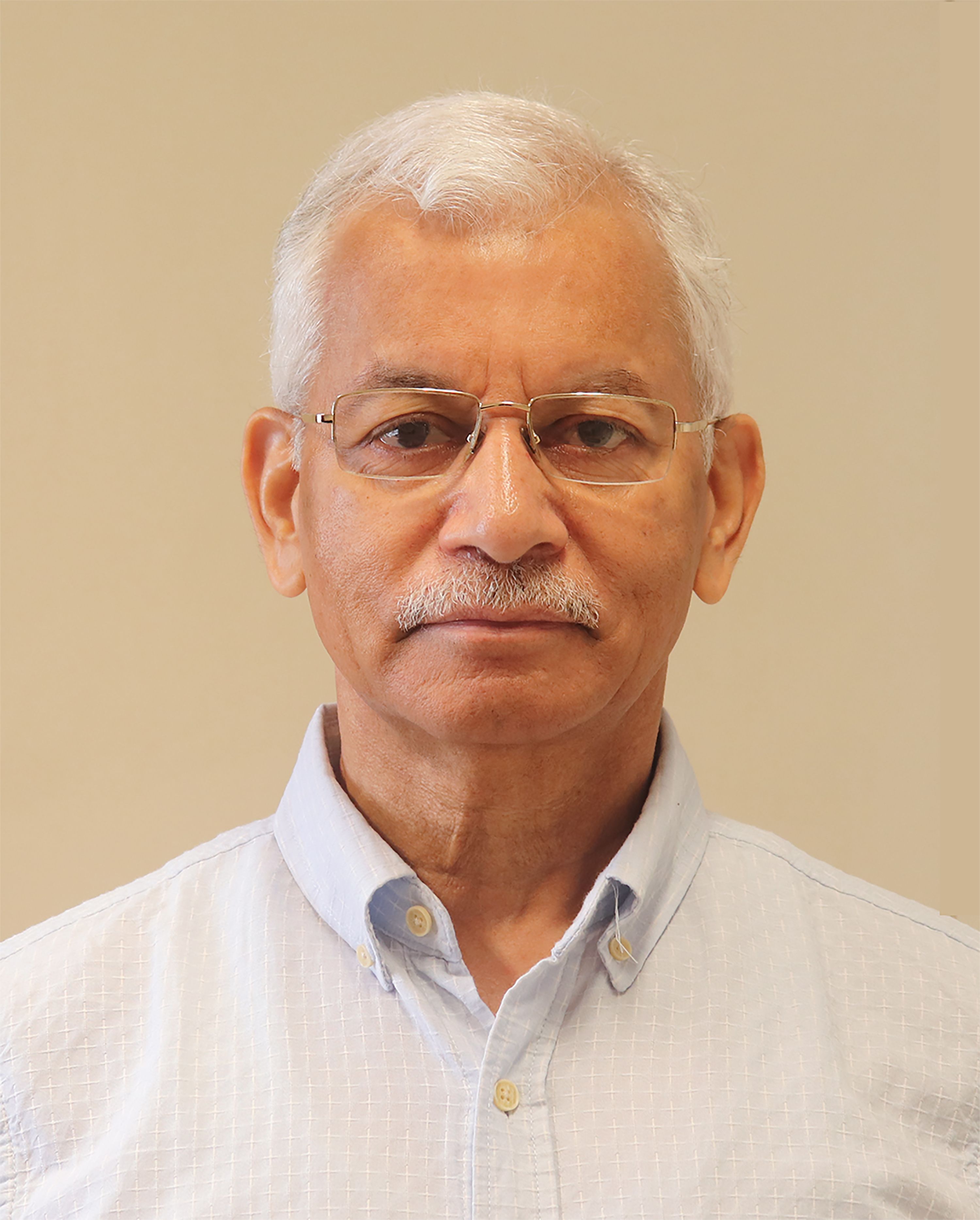 latest passport size photo of Mr Rajeev Kher.jpg